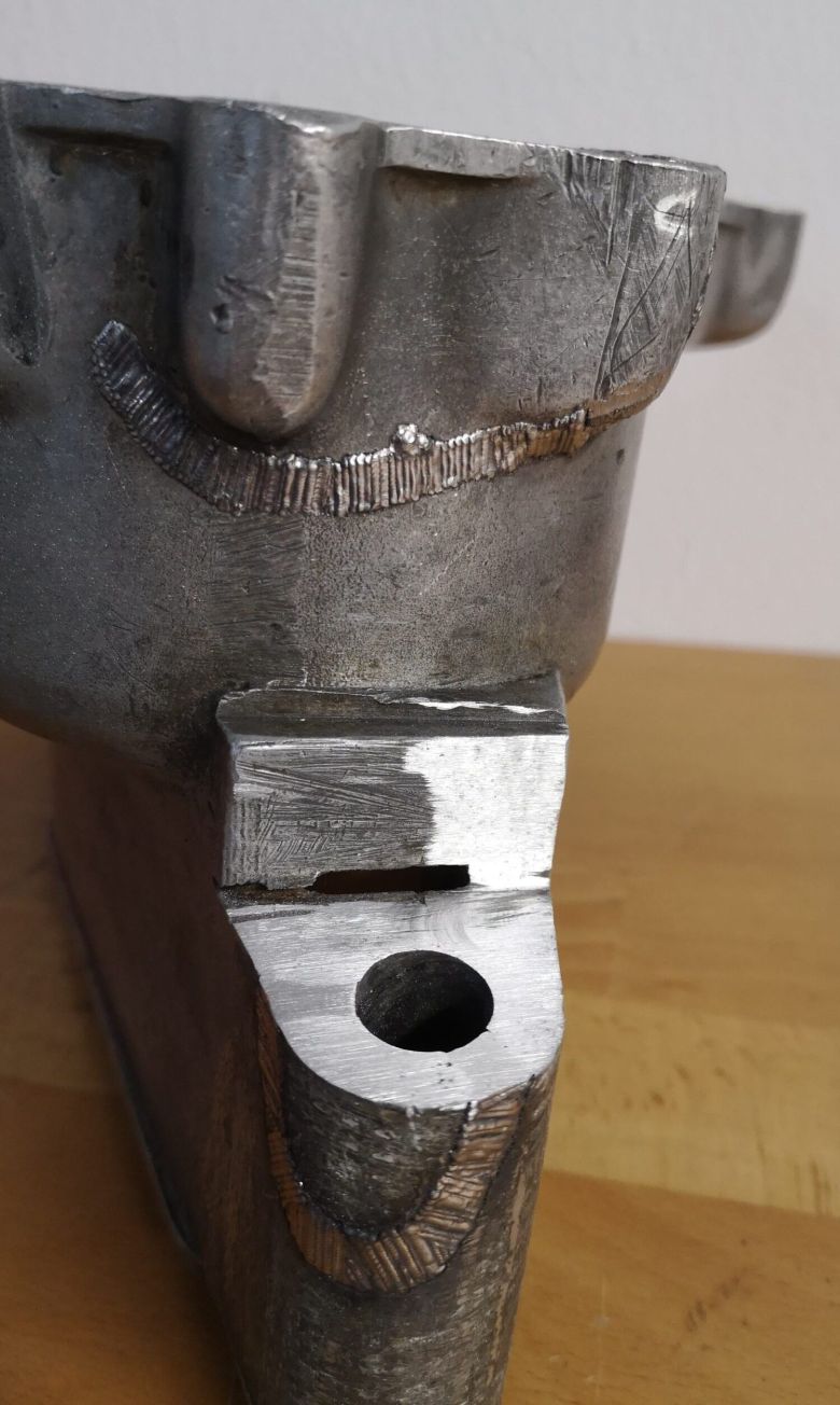 Gearbox repair on vintage motorcycle_welded broken corner and welded crack in gearbox housing