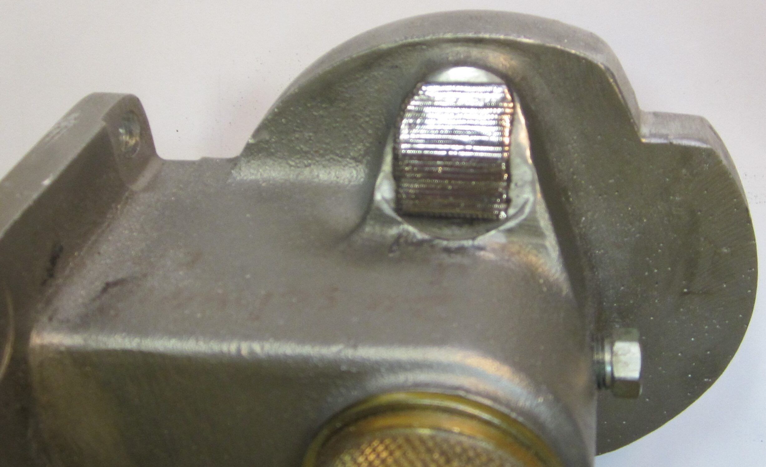 Classic car workshop_Welding oil filter adapter_gray cast iron